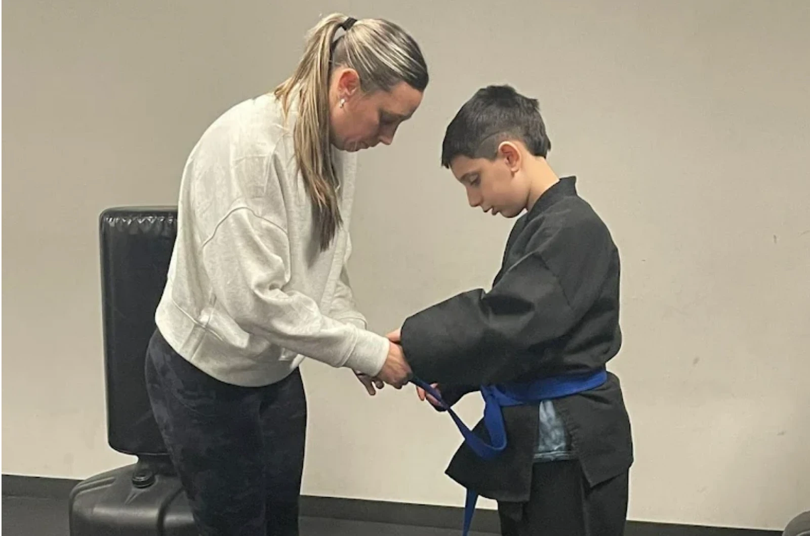Child building confidence in martial arts